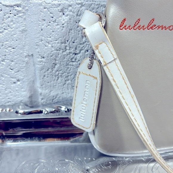 Lululemon metallic and white wristlet​​ - Picture 2 of 8
